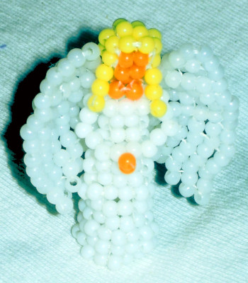 Beaded white angel doll
